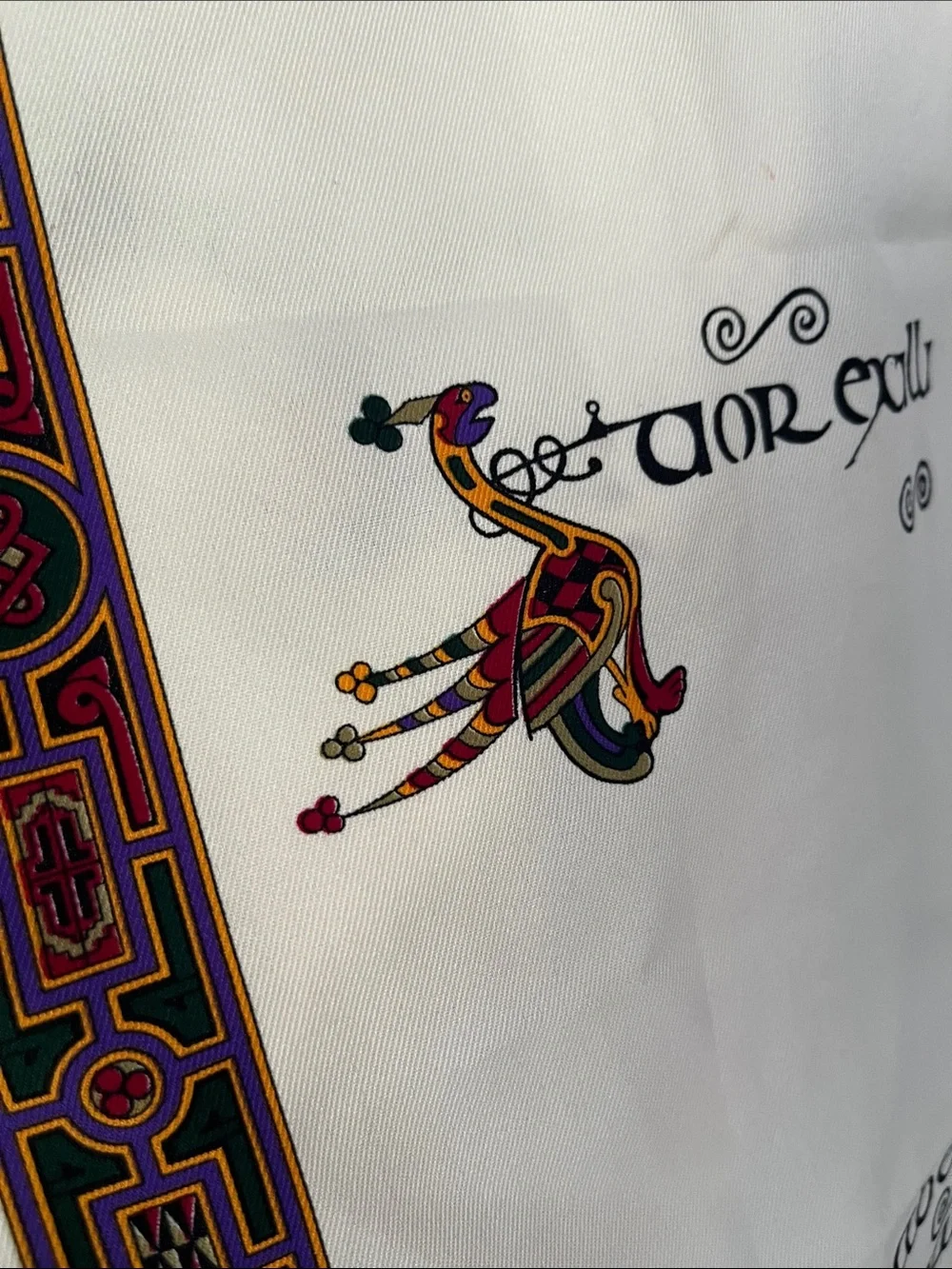 Irish Inspired Cream Scarf with Green Border and Multicolor Celtic Motif